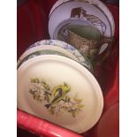 A crate of china plates