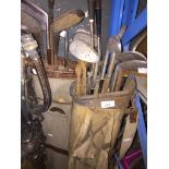 2 sets of old golf clubs and bags.