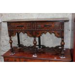 A 17th Century style oak dresser base.