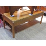 A Reynolds of Ludlow mid 20th century Cotswold School walnut coffee table with two drawers and