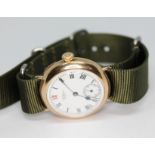 An early 20th century hallmarked 9ct gold Waltham trench style wristwatch having white signed enamel