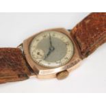 A 1930s hallmarked 9ct gold 15 jewel manual wind wristwatch with unsigned dial having Arabic