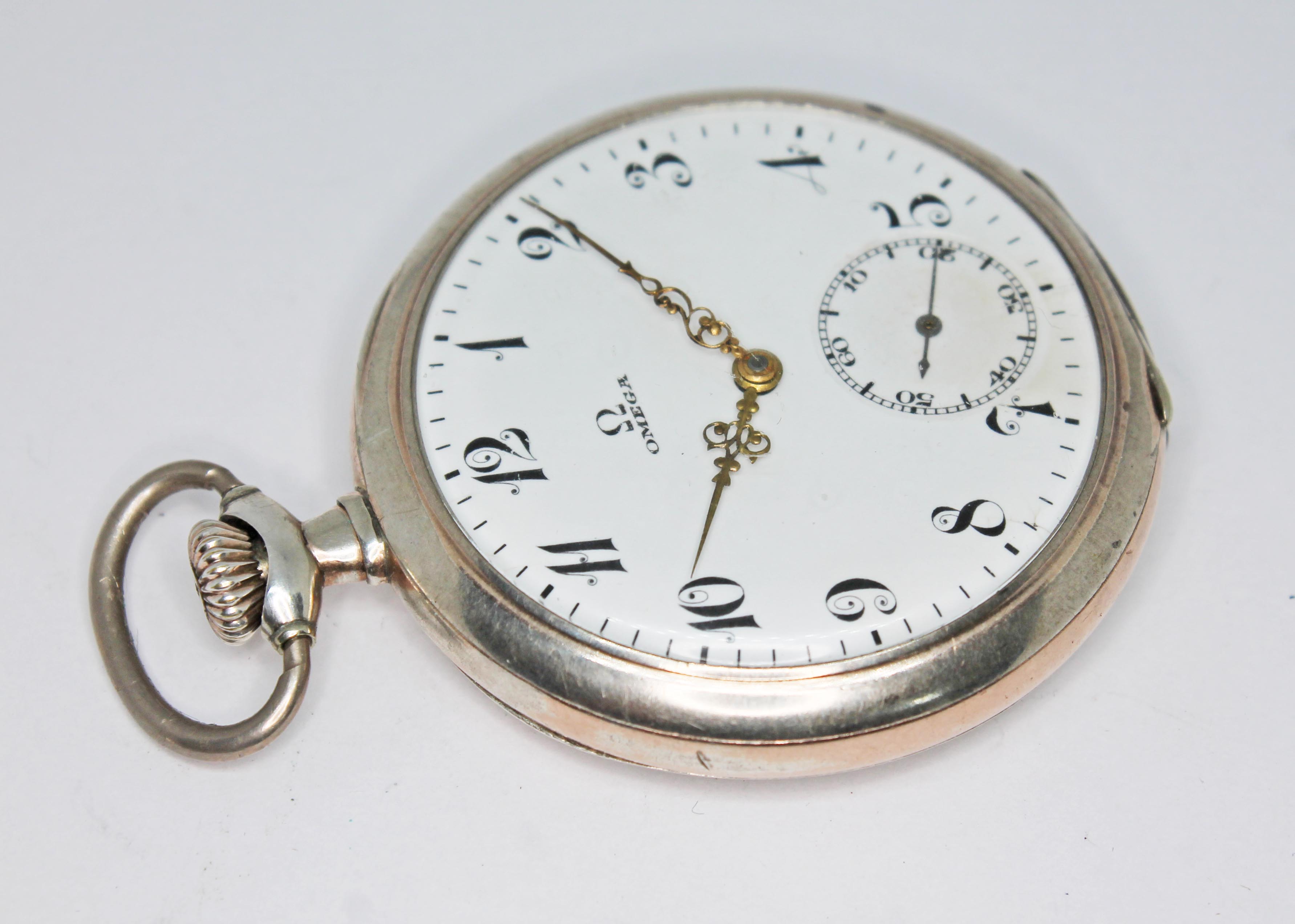 A 1920s Omega silver cased open face pocket watch, the signed white enamel dial having ornate Arabic - Image 2 of 3