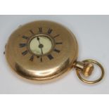 A late 19th/early 20th century gold plated Waltham half hunter pocket watch, the white enamel dial