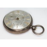 An early 20th century hallmarked silver open face pocket watch having silvered foliate decorated