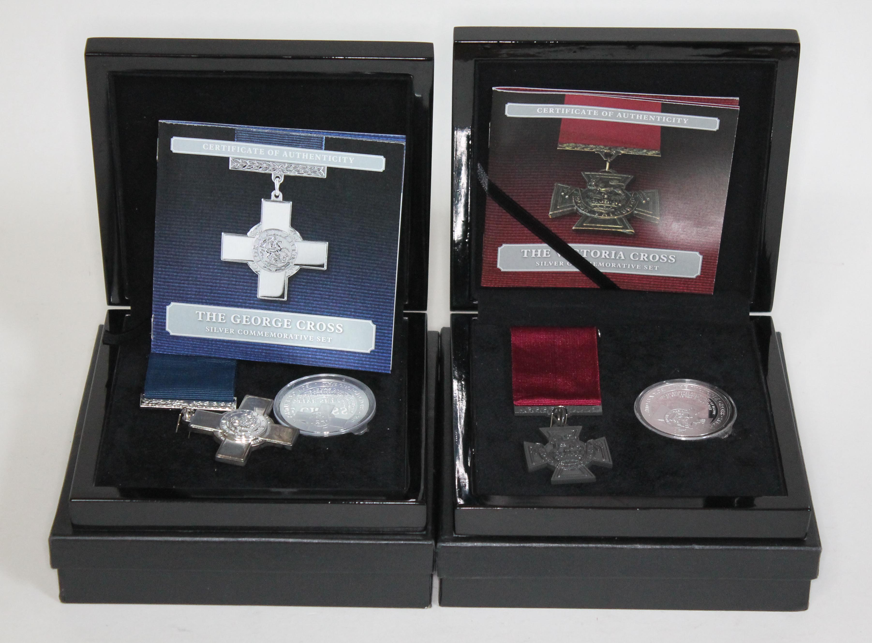 Two cased Bradford Exchange replica medal and silver proof coin sets: 'The George Cross' and 'The