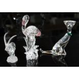 Three Swarovski figures comprising Flamingo, Crystal Symbols Cat with green collar and Sable