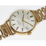A vintage 18K gold Longines Ultra-Chron automatic wristwatch with signed silvered dial having
