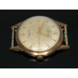 A 1950s hallmarked 9ct gold Accurist 21 jewel manual wind wristwatch with signed champagne dial