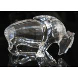 A Swarovski Buffalo figure with box.