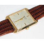 A vintage 1970s 9ct gold Record de luxe wristwatch, the signed gold tone dial with hour and hand