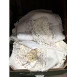 A box of linen and crotchet ware