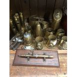 A quantity of small mainly WWII trench art items including table lighters, shells, etc and a spark