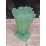 An Art Deco green pressed glass vase.