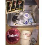 Tin of Leyland Motors memorabilia