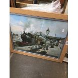 A framed and glazed print of a steam engine by Petrie