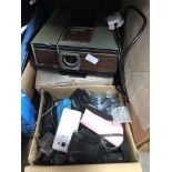 A box of various small digi cameras, various mobile phones, pink Nintendo DS, etc.