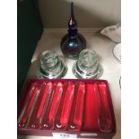 Okra glass scent bottle, set of Daum crystal knife rests, and a pair of Scandinavian candle holders