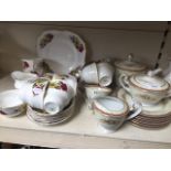 2 floral tea sets, one including teapot