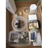 A box containing various coins, bank notes, watches, beads and napkin rings etc.