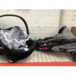 A Joie buggy/pram and a Cybex baby car seat