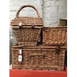 Three wicker picnic hamper baskets - empty.
