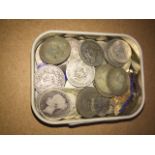 Small tin of silver coloured coins