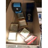 A box of items comprising three travel clocks, a gold plated boxed Sekonda 23 jewel manual wind