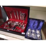 A canteen of Osborne silver plated and stainless steel kings pattern cutlery and a cased set of