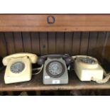 Three vintage telephones