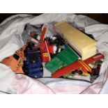 A bag of playworn toy car