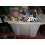 A box of toys to include Simpsons games, blox space station rocket, 30+ figures, blox bricks and