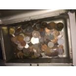 Vintage veteran series cash tin with world coins.
