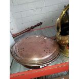 A copper warming pan