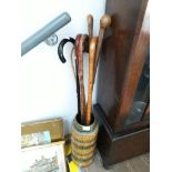 A West German pottery stick stand and contents.