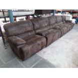A six section brown suede reclining settee. Approx. 15 ft.