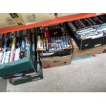 boxes of dvds and 2 boxes of vhs cassettes