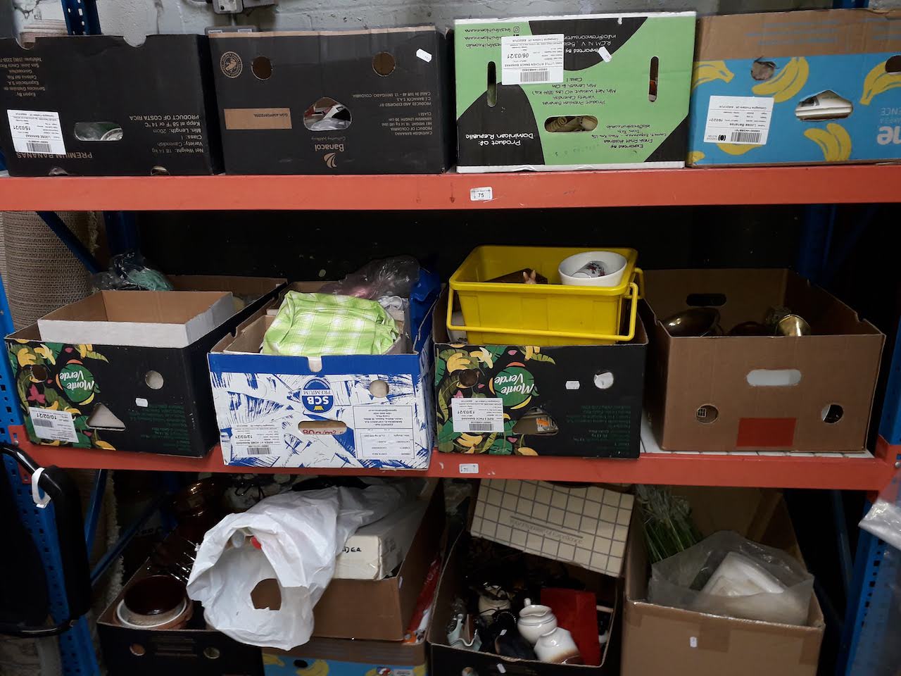 15 boxes of mixed household items including brassware, pottery, glass, linen, planters etc