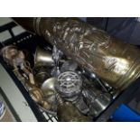 A box of various metalware