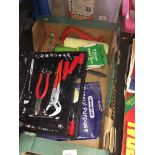 A box of tools and decorating items.