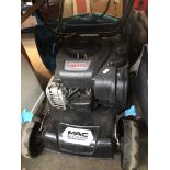 A Macallister petrol lawn mower.