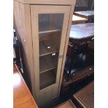 A modern tall and narrow cabinet
