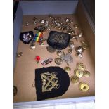 Two WWII home & country badges, cap badge and military buttons