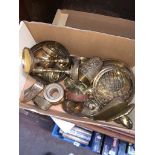 A collection of brass to include candlestick holders, cups, etc.