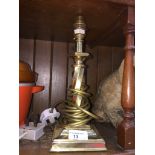 A twist column brass table lamp.