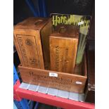 Harry Potter memorabilia - Hogwarts School wooden boxes and a repro tin sign.