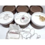 Five items of Nikki Lissoni jewellery comprising bracelet, chain and three boxed pendant necklaces.