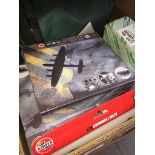 A box of Airfix kits games, Skittle game, track, a clock, etc.