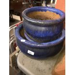 3 blue glazed graduated planters.