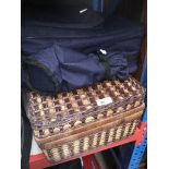 A fitted picnic hamper and a picnic case / rucksack.